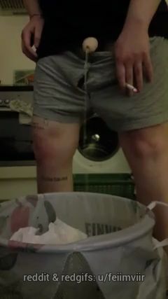 Trans Girl Urinates in Trash Can
